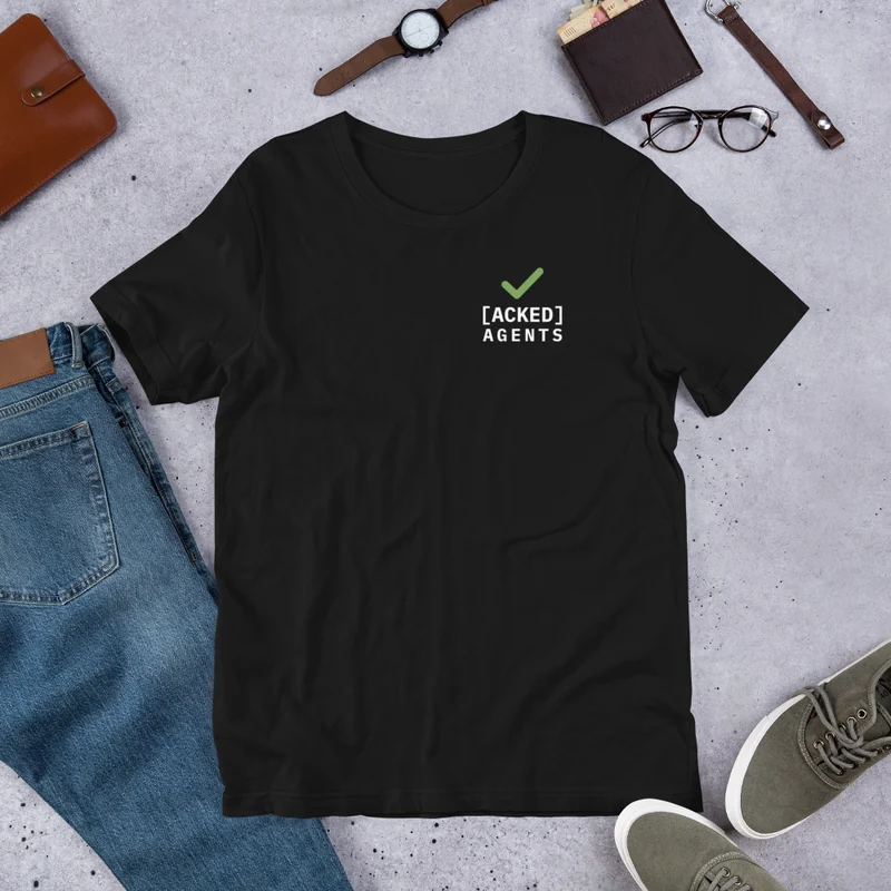 Receipt tee front laid flat on a gray surface beside jeans, sneakers, glasses and a watch